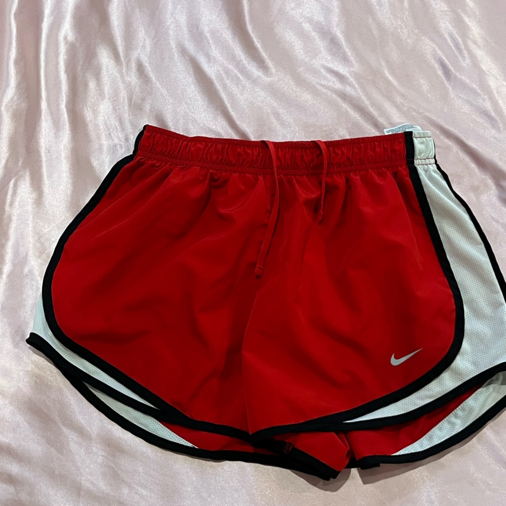 Red Nike shorts